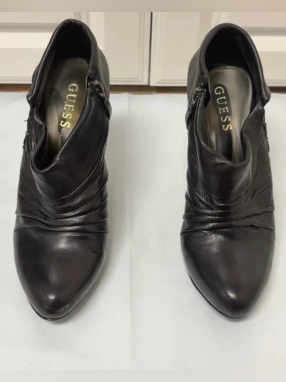 GUESS Black Pointed Leather Ankle Booties with Ruched Detail